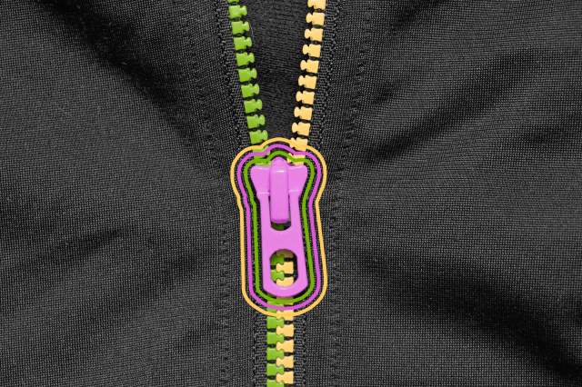 Close-up of a half-zipped zipper