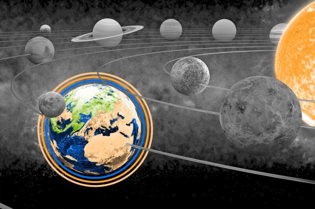 The sun and nine planets of the solar system in orbit