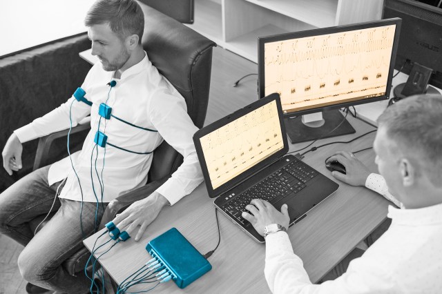 Man undergoing a polygraph test