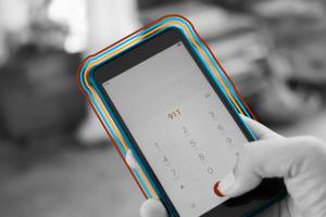 Dialing 911 on smartphone screen