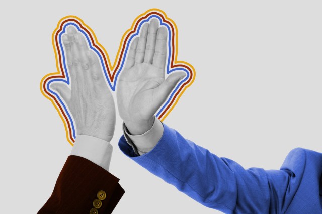 Close-up of a high five